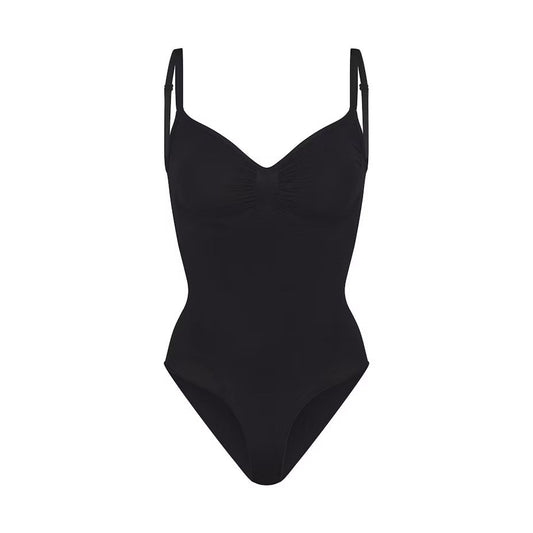 Skims Kardashian with the same sexy non-marking one-piece shapewear waist belly triangle hip thong